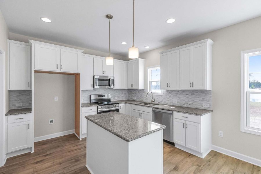 Representative furnished interior of a home built from the Magnolia by Caviness & Cates Communities in Bartlett Manor, Youngsville (Image 186).