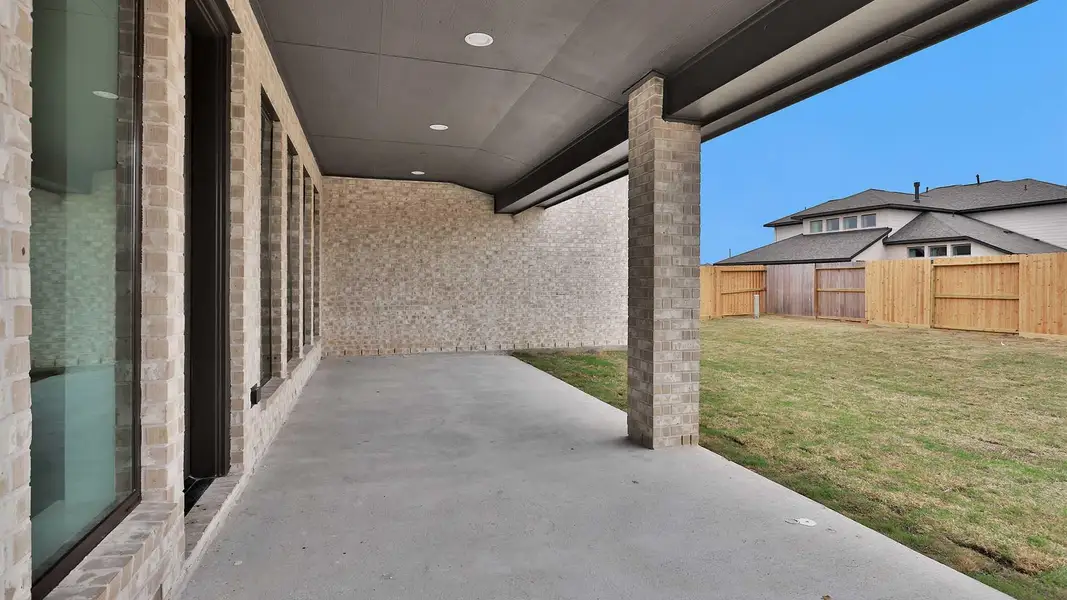 Exterior details and patio area of a home in Candela, Richmond (Image 3).