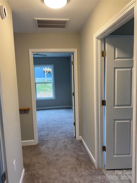 HALLWAY BETWEEN TWO UPSTAIRS BEDROOMS