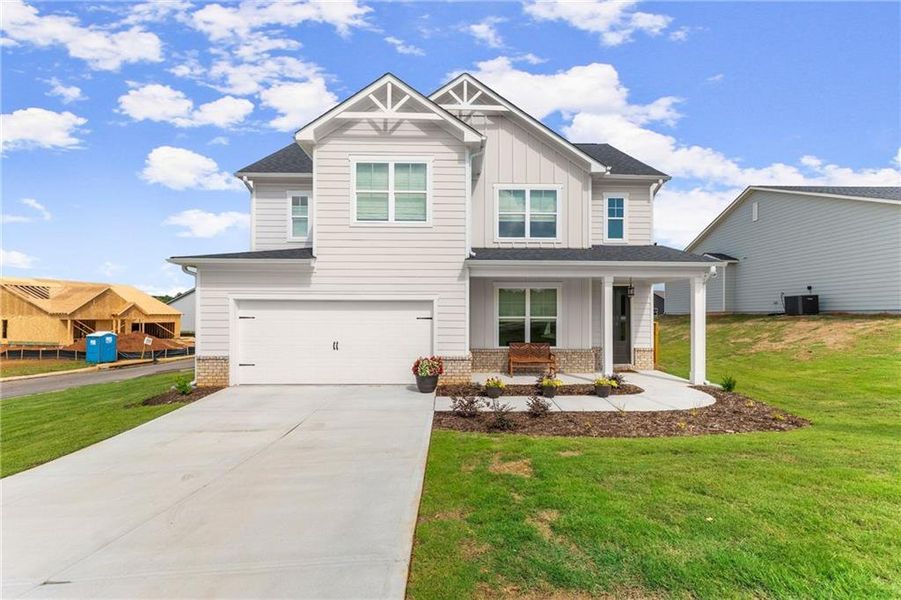 Front exterior of a new home in , Homer, GA, highlighting curb appeal (Image 2). Front exterior of a new home in , Homer, GA, highlighting curb appeal (Image 2).