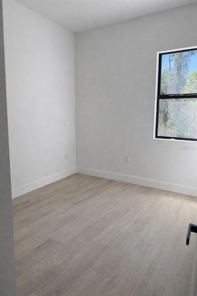 Spacious, unfurnished interior of a new home in , Port Charlotte (Image 10).