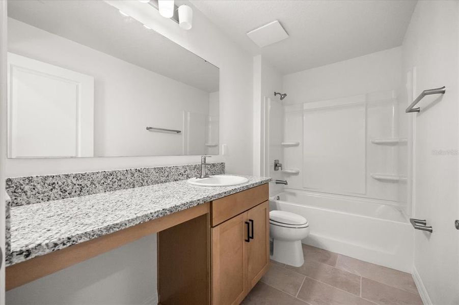 Furnished interior view inside a new home in Hickory Ranch, Auburndale (Image 7).