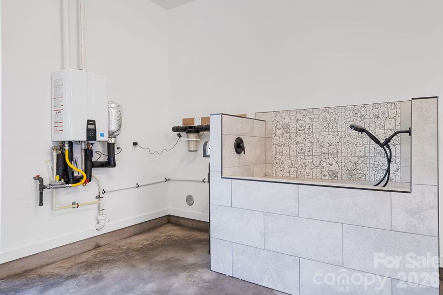 Custom dog washing station in the garage