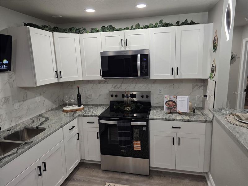 Furnished interior view inside a new home in , Plant City (Image 52).