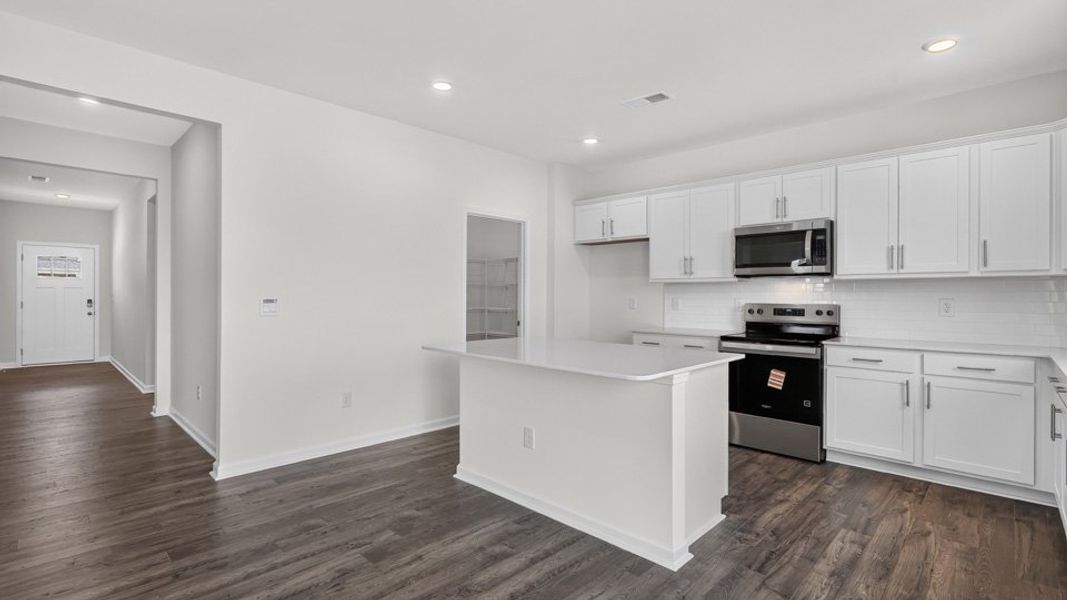 Furnished interior view inside a new home in The Reserve at Prestleigh, Wake Forest (Image 6).