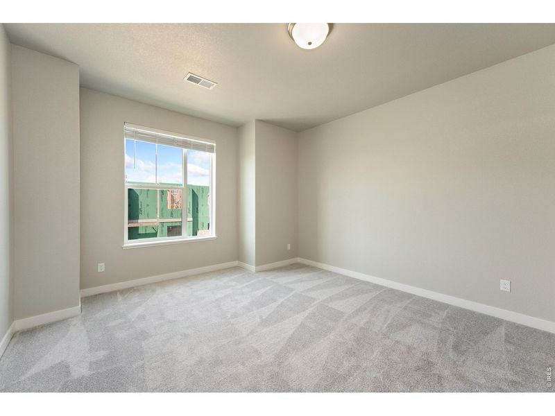 Spacious, unfurnished interior of a new home in The Lakes at Centerra, Loveland (Image 21).