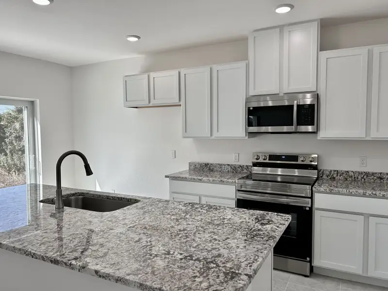 Furnished interior view inside a new home in Lehigh Acres, Lehigh Acres (Image 3).