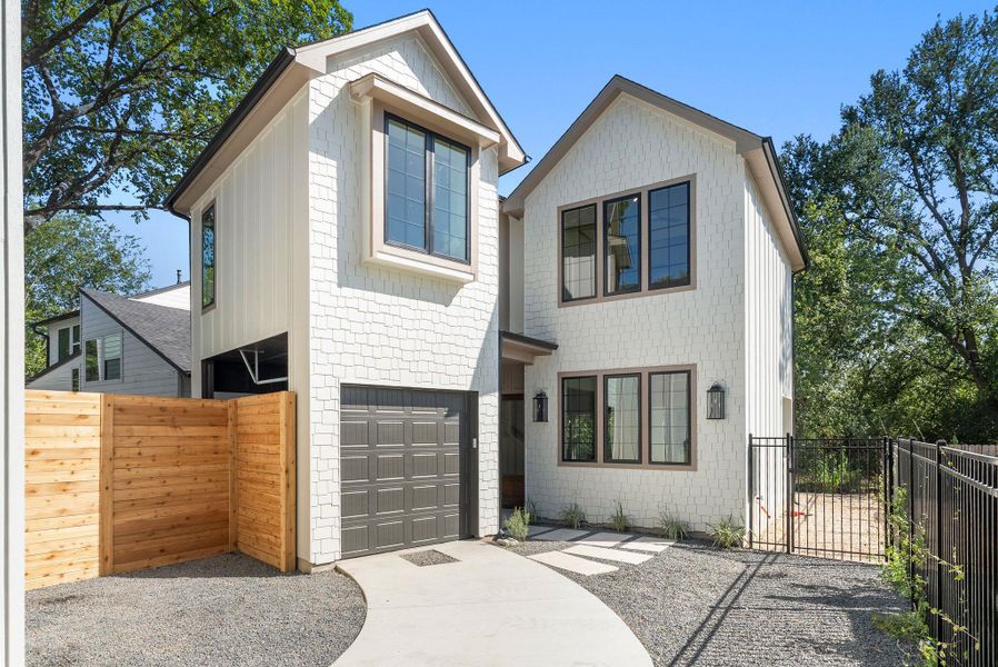 Front exterior of a new home in , Austin, TX, highlighting curb appeal (Image 1). Front exterior of a new home in , Austin, TX, highlighting curb appeal (Image 1).