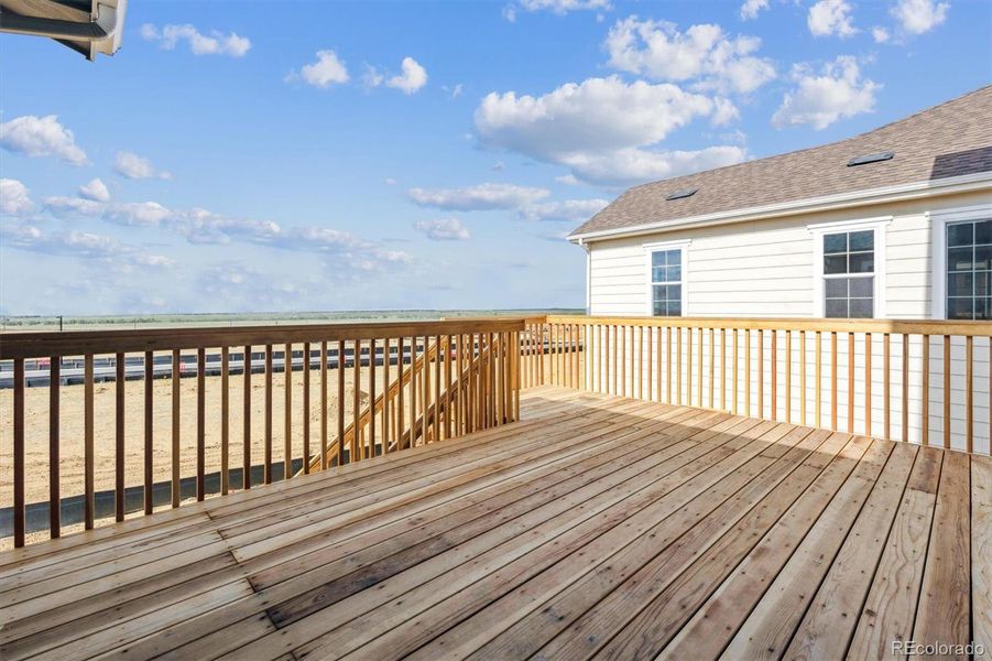 Exterior details and patio area of a home in Harvest Crossing, Aurora (Image 18).