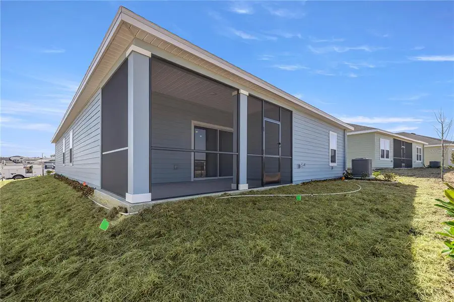 Exterior details and patio area of a home in Millwood, Ocala (Image 3).