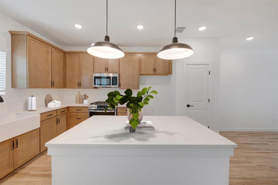 Lovely island kitchen (*Photo not of actual home and used for illustration purposes only.)