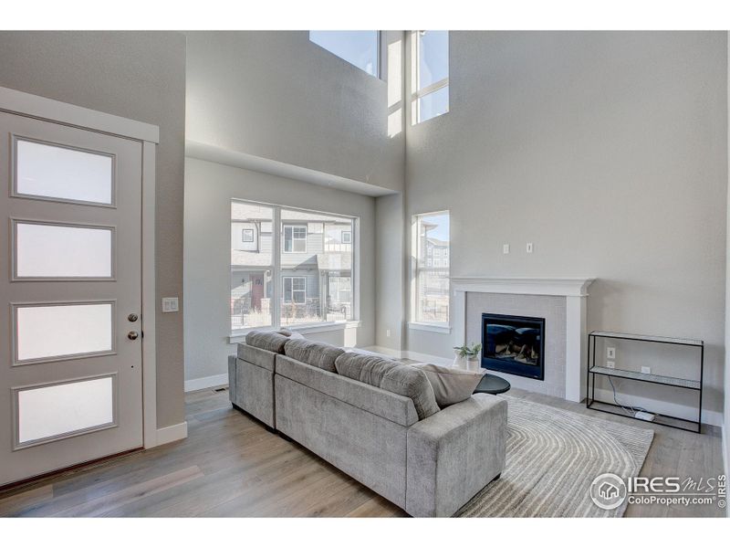 Living Room with Gas Fireplace-  Photos not of the actual unit. Finishes vary.