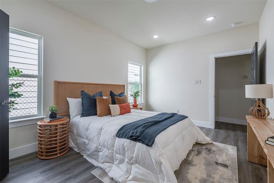 Bedroom featuring dark hardwood / wood-style flooring