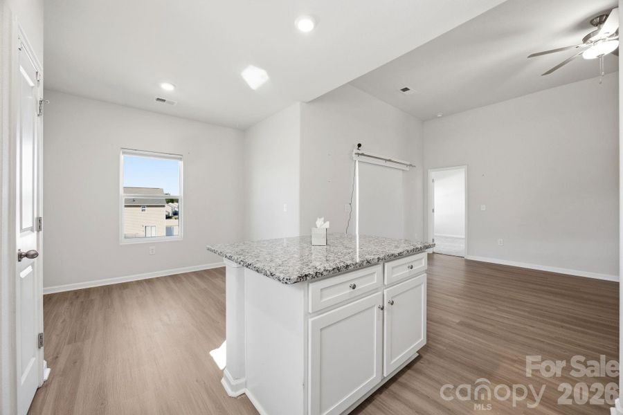Furnished interior view inside a new home in Stagecoach Station, Gastonia (Image 6).
