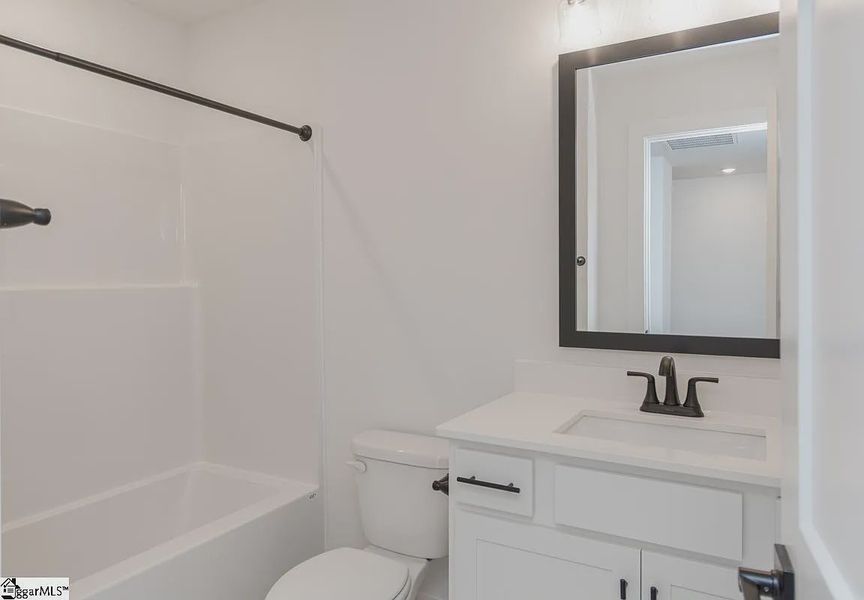 Representative furnished interior of a home built from the 1568 Townhome by Adams Homes in Parkstone Place Townhomes, Roebuck (Image 7). Representative furnished interior of a home built from the 1568 Townhome by Adams Homes in Parkstone Place Townhomes, Roebuck (Image 7).