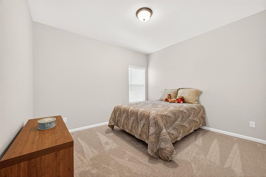 Furnished interior view inside a new home in Mill Creek Trails, Magnolia (Image 38).