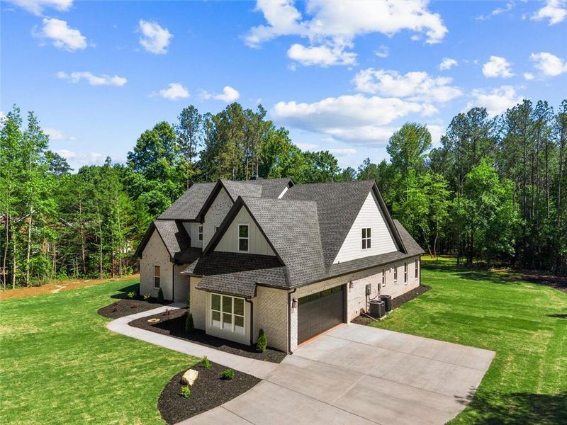 Front exterior of a new home in , Hull, GA, highlighting curb appeal (Image 33).