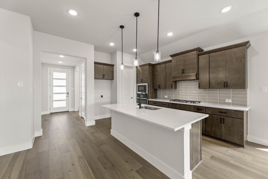 Representative furnished interior of a home built from the Aspen by Tri Pointe Homes in Treeline, Justin (Image 5).