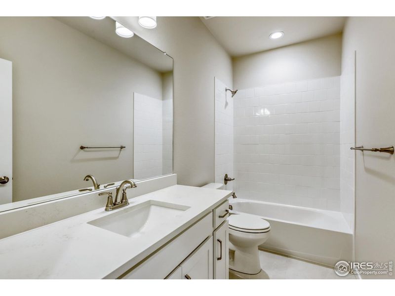 Furnished interior view inside a new home in Barefoot Lakes, Firestone (Image 10).