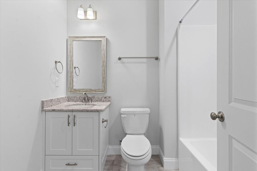 Guest Bathroom | 264 Prominence Drive, Stylish & Functional Guest Bathroom | 264 Prominence Drive, Stylish & Functional
