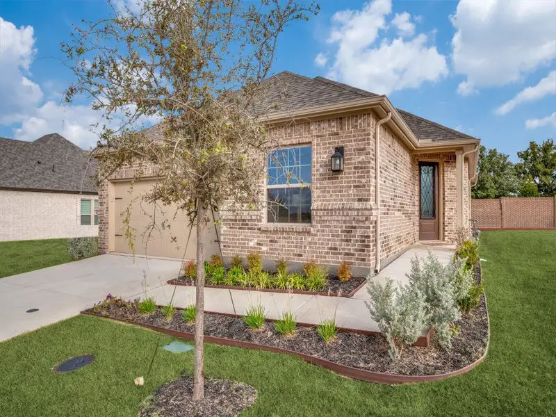 Representative exterior photo of a completed home built from the Messina by Ladera Texas in Ladera at Tavolo Park, Fort Worth, TX (Image 2). Representative exterior photo of a completed home built from the Messina by Ladera Texas in Ladera at Tavolo Park, Fort Worth, TX (Image 2).