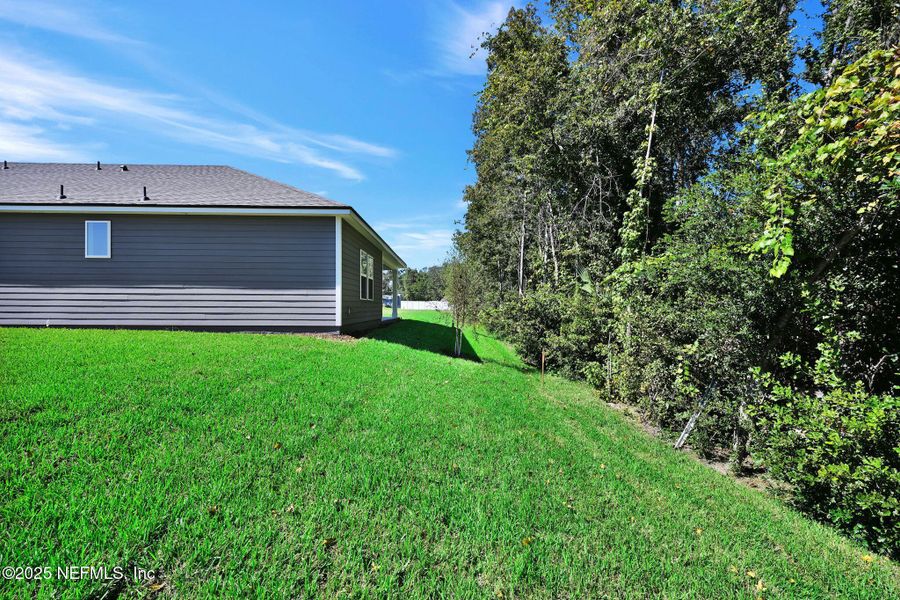 Exterior details and patio area of a home in McGirt's Creek, Yulee (Image 20).