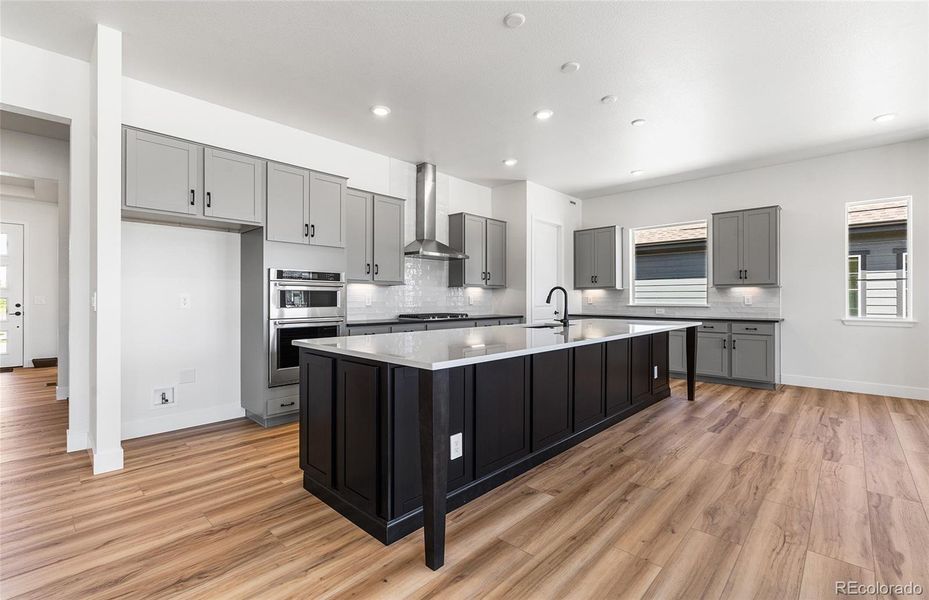 Furnished interior view inside a new home in Hilltop at Inspiration, Aurora (Image 6).
