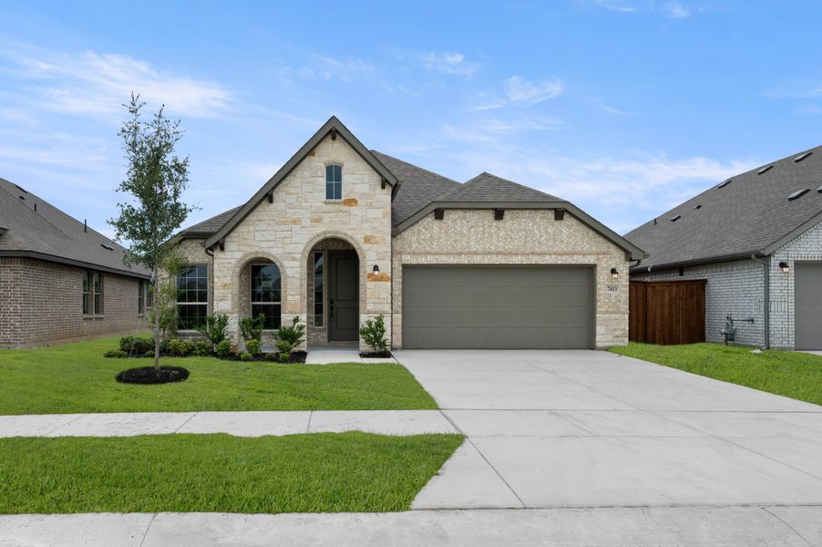 Front exterior of a new home in Meadow Park at The Meadows, Ponder, TX, highlighting curb appeal (Image 1). Front exterior of a new home in Meadow Park at The Meadows, Ponder, TX, highlighting curb appeal (Image 1).