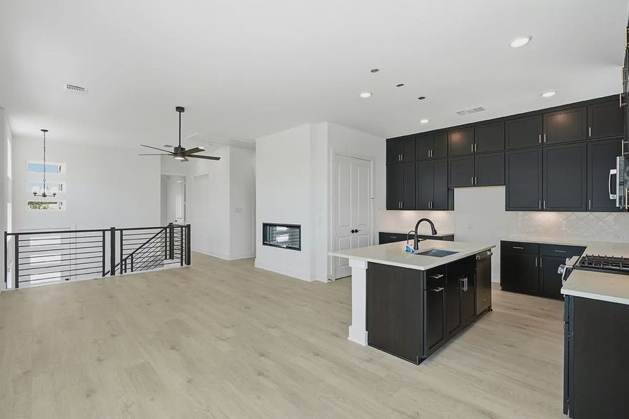 Representative furnished interior of a home built from the Athena by Chesmar Homes in Prominence Urban, San Antonio (Image 11).