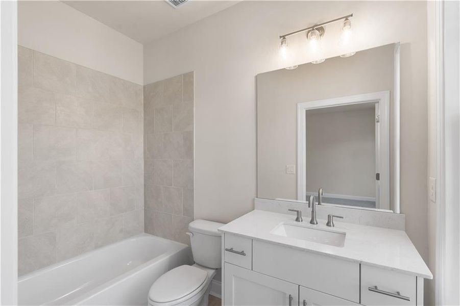 Furnished interior view inside a new home in Ward's Crossing Townhomes, Johns Creek (Image 5).