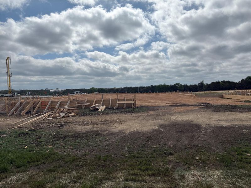 View of yard with a rural view