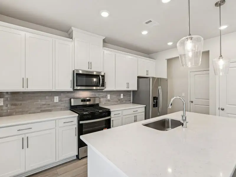 Furnished interior view inside a new home in Harmony Manor, Fairburn (Image 7).