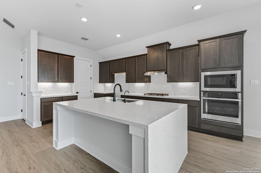 Furnished interior view inside a new home in The Reserve at Potranco Oaks, Castroville (Image 9).