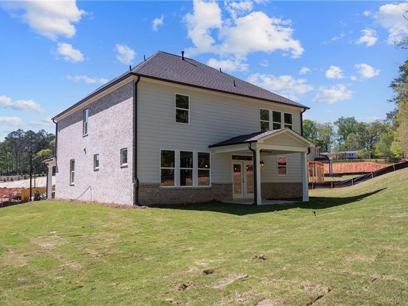 Exterior details and patio area of a home in Melody Lakeside Estates, Buford (Image 21).