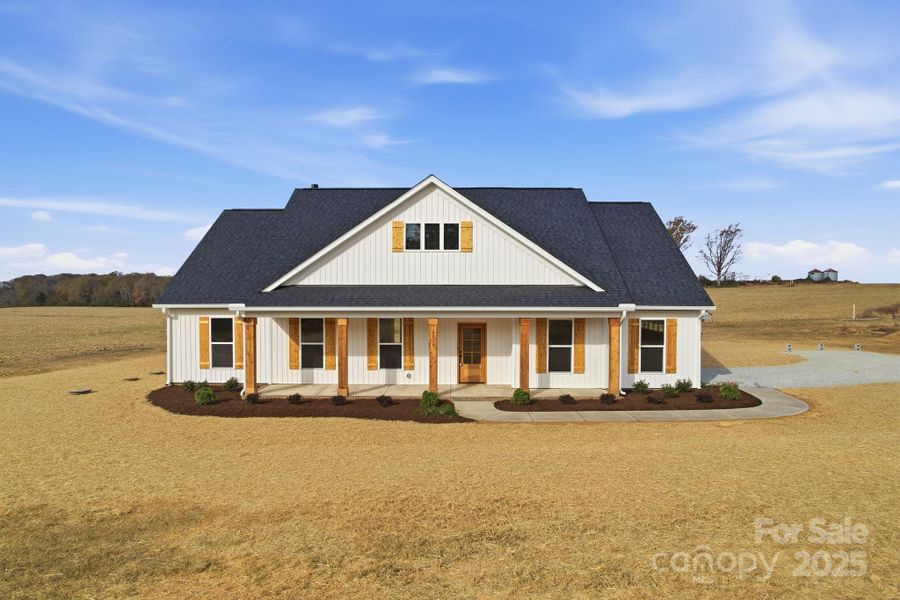 Front exterior of a new home in , Marshville, NC, highlighting curb appeal (Image 1).