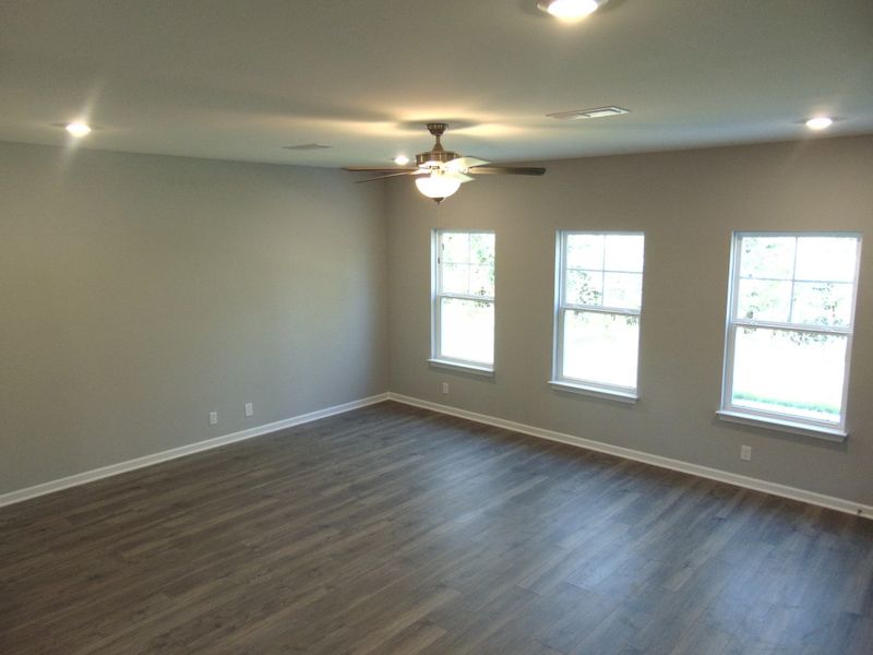 This spacious and enlightened family room where you can host movie nights, and holiday fun in the comfort of your home.