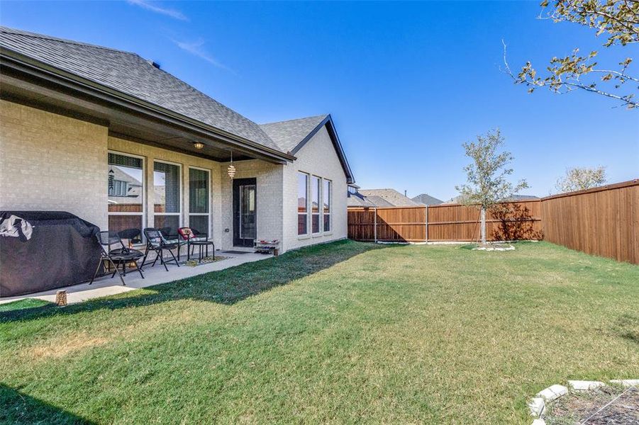 Backyard with covered patio