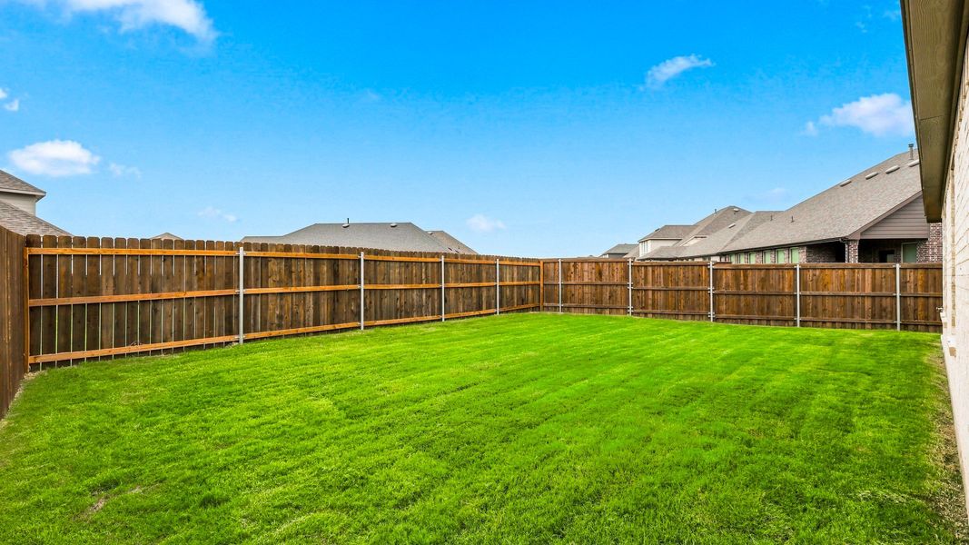 Exterior details and patio area of a home in The Oaks, Red Oak (Image 3). Exterior details and patio area of a home in The Oaks, Red Oak (Image 3).