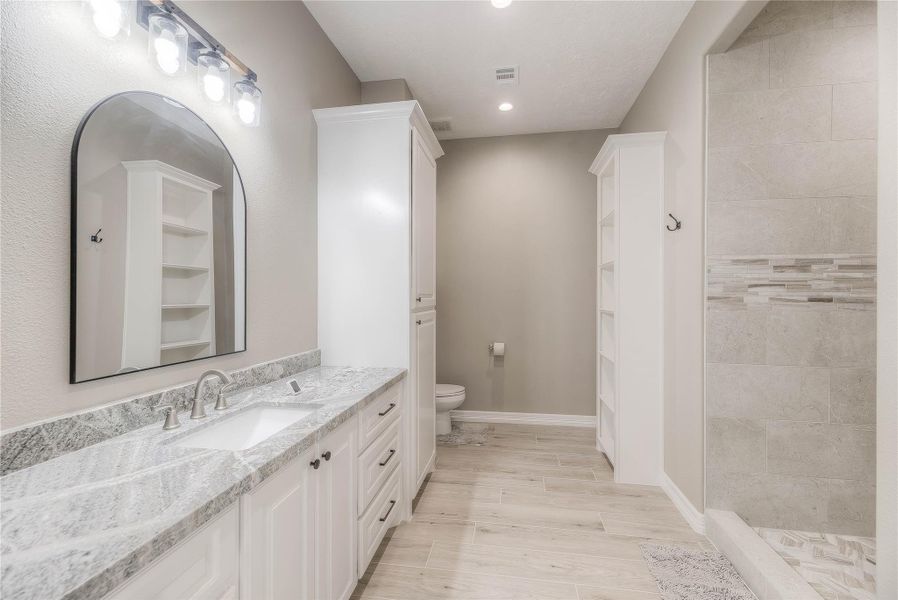 Bathroom 3/3 with plenty of counter and cabinet space with great lighting and a stand up shower Bathroom 3/3 with plenty of counter and cabinet space with great lighting and a stand up shower