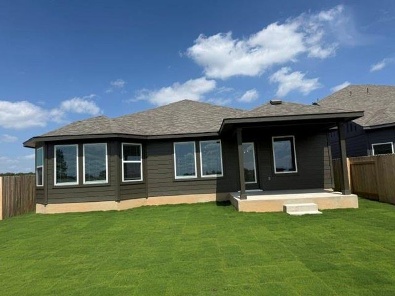 Exterior details and patio area of a home in Butler Farms - Boulevard Collection, Liberty Hill (Image 3). Exterior details and patio area of a home in Butler Farms - Boulevard Collection, Liberty Hill (Image 3).