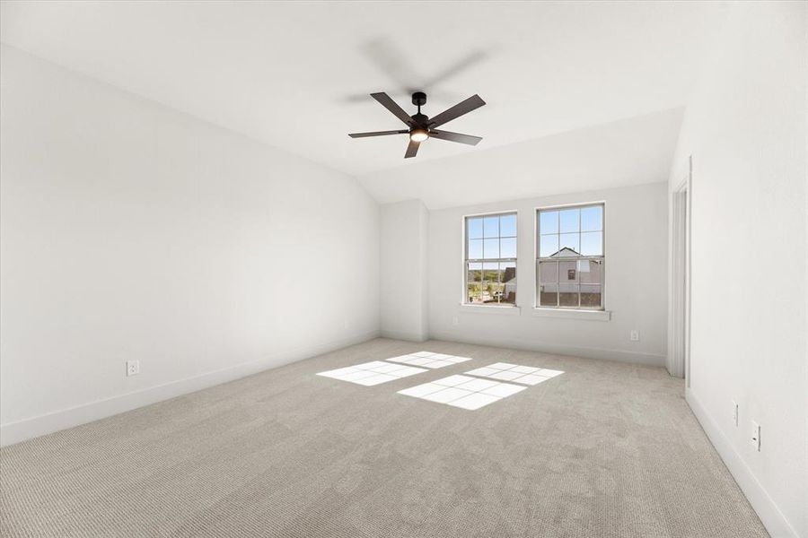 Your dreamy owner's bedroom offers plenty of space and natural light.