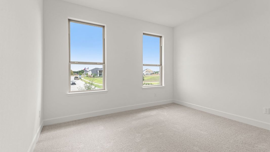 Spacious, unfurnished interior of a new home in Lakes of Cane Island, Katy (Image 18).