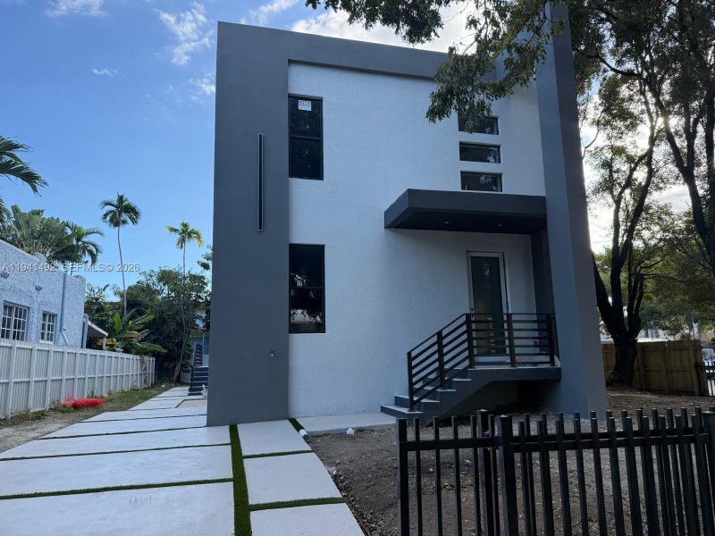 Exterior details and patio area of a home in , Miami (Image 3).