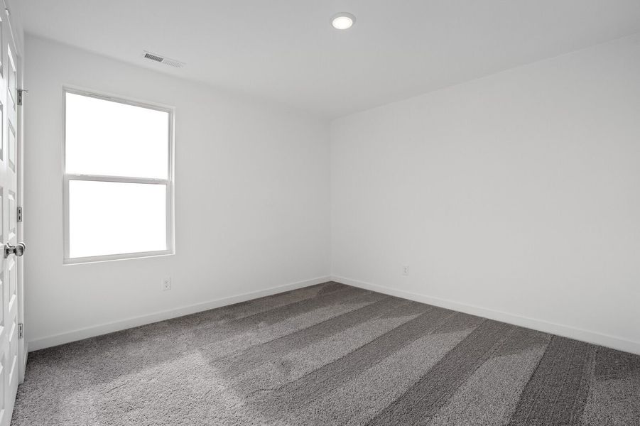 Spacious, unfurnished interior of a new home in Sage Farms, White House (Image 33).