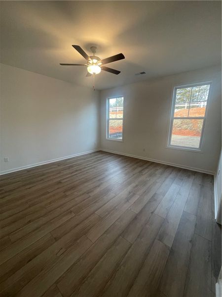 Spacious, unfurnished interior of a new home in Springwood Grove, Central (Image 12).