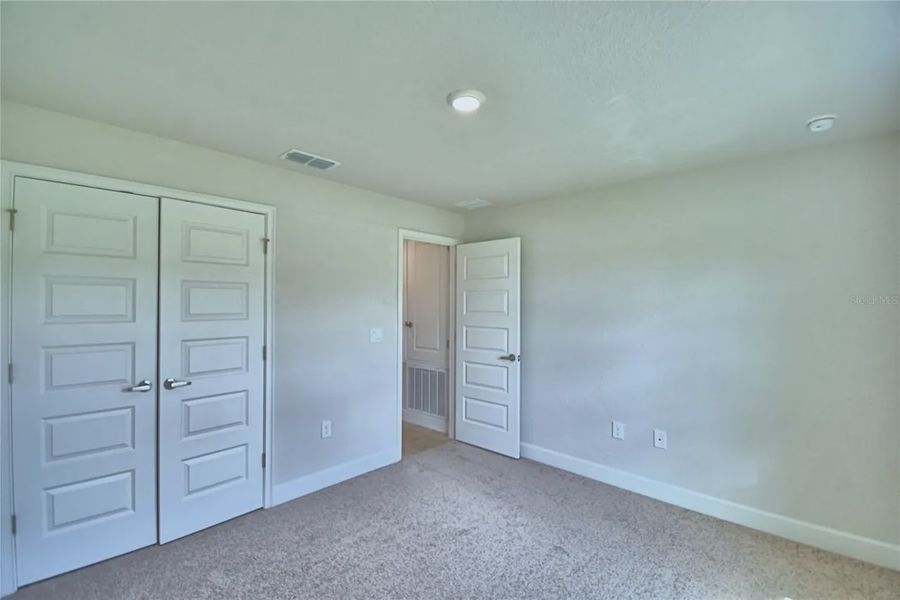 Spacious, unfurnished interior of a new home in Cadence Crossing, Auburndale (Image 27).