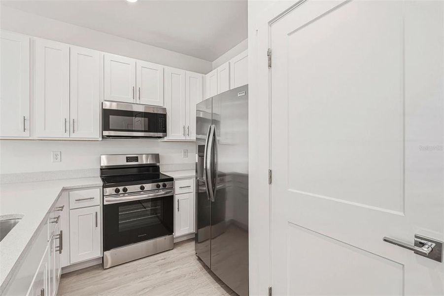 Furnished interior view inside a new home in , Punta Gorda (Image 9).