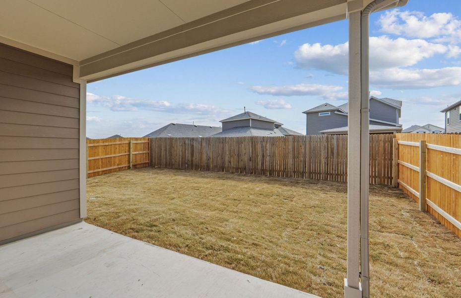 Exterior details and patio area of a home in Crosswinds, Kyle (Image 25).