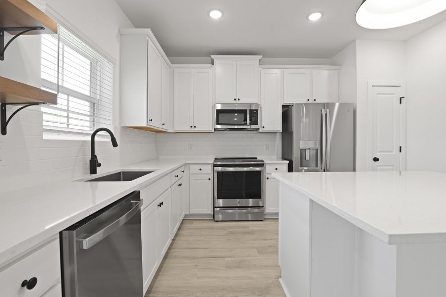 Kitchen with stainless steel appliances