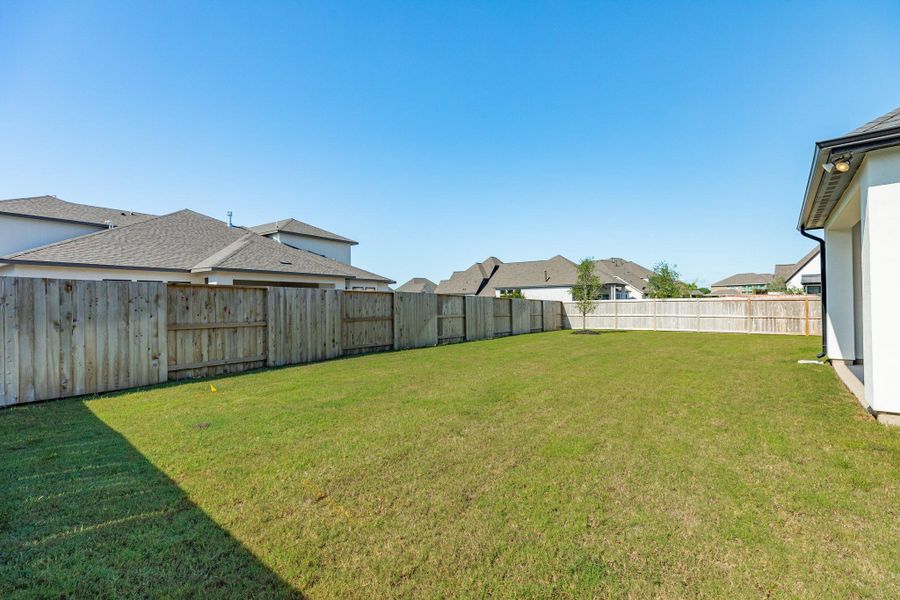 Spacious backyard offering the perfect canvas to create your very own private oasis. Enjoy added peace of mind and enhanced seclusion knowing the home directly behind the property is situated to provide exceptional privacy, keeping your outdoor space tucked away from view.